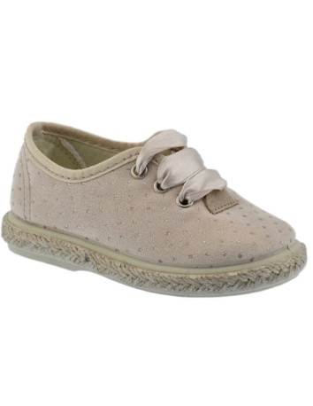 Zapato casual decorado con topitos en color beig y piso...
