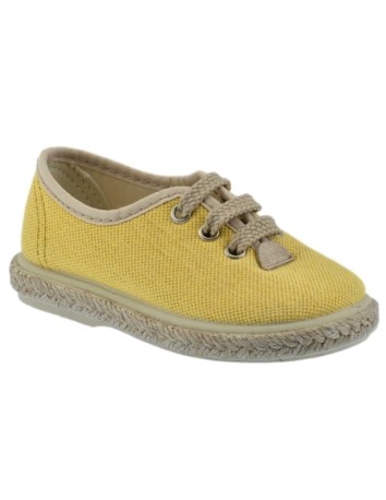 Zapato casual en tejido lino color amarillo yema y piso...