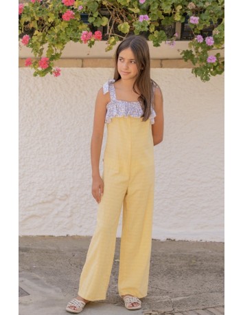 La ormiga mono de niña amarillo lazos