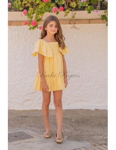La ormiga vestido de niña amarillo liso
